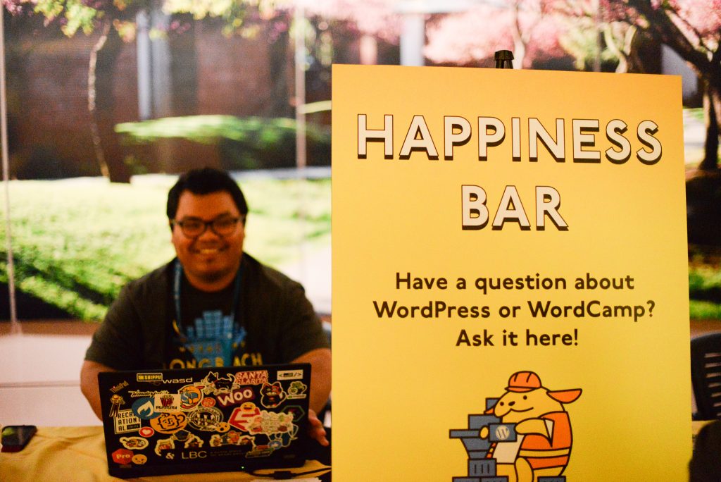David Nuon sitting at his Happiness Bar