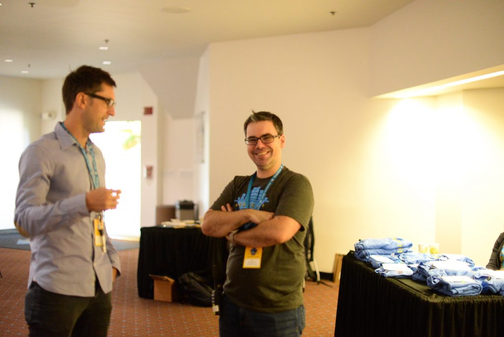 Nicolas "Nico" Gauthier-Pin (right) laughing with an attendee (left)